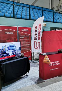 Ruthon Groupin julisteet ja standi messuilla Saimaprint Oy